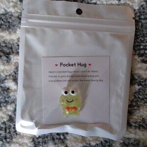 2/$15 All listings. New resin frog with bow tie pocket hug. Novelty gift
